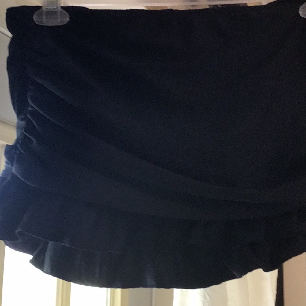 Black tankini bottoms built into skirt. Size 14 women’s